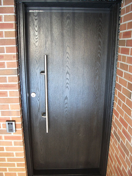 Modern Contemporary Front Entrance Door, Woodgrain Single Door installed by modern-doors.ca in Woodbridge Ontario